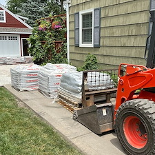 TRANSFORMING-DRIVEWAYS-WITH-ELEGANCE-A-DETAILED-LOOK-AT-OUR-LATEST-HERRINGBONE-PATTERN-DRIVEWAY-PROJECT-IN-NAPERVILLE-ILLINOIS 7