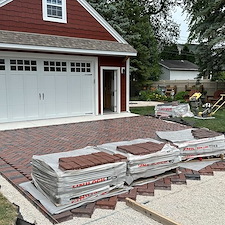 TRANSFORMING-DRIVEWAYS-WITH-ELEGANCE-A-DETAILED-LOOK-AT-OUR-LATEST-HERRINGBONE-PATTERN-DRIVEWAY-PROJECT-IN-NAPERVILLE-ILLINOIS 6