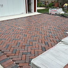 TRANSFORMING-DRIVEWAYS-WITH-ELEGANCE-A-DETAILED-LOOK-AT-OUR-LATEST-HERRINGBONE-PATTERN-DRIVEWAY-PROJECT-IN-NAPERVILLE-ILLINOIS 5