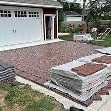 TRANSFORMING-DRIVEWAYS-WITH-ELEGANCE-A-DETAILED-LOOK-AT-OUR-LATEST-HERRINGBONE-PATTERN-DRIVEWAY-PROJECT-IN-NAPERVILLE-ILLINOIS 4