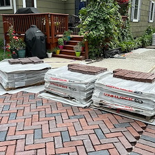 TRANSFORMING-DRIVEWAYS-WITH-ELEGANCE-A-DETAILED-LOOK-AT-OUR-LATEST-HERRINGBONE-PATTERN-DRIVEWAY-PROJECT-IN-NAPERVILLE-ILLINOIS 3