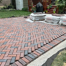 TRANSFORMING-DRIVEWAYS-WITH-ELEGANCE-A-DETAILED-LOOK-AT-OUR-LATEST-HERRINGBONE-PATTERN-DRIVEWAY-PROJECT-IN-NAPERVILLE-ILLINOIS 0