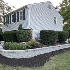 Transforming-Landscapes-The-Artistry-of-Mission-Brick-Pavings-Curved-Retaining-Wall-in-Naperville-Illinois 0