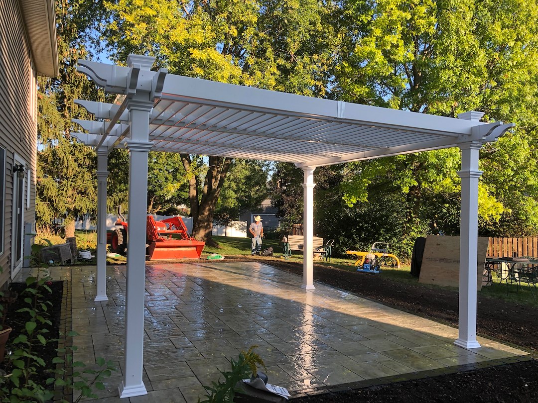 Transforming Outdoor Spaces: A Stunning Brick Paver Patio & Pergola Installation in Carol Stream, Illinois